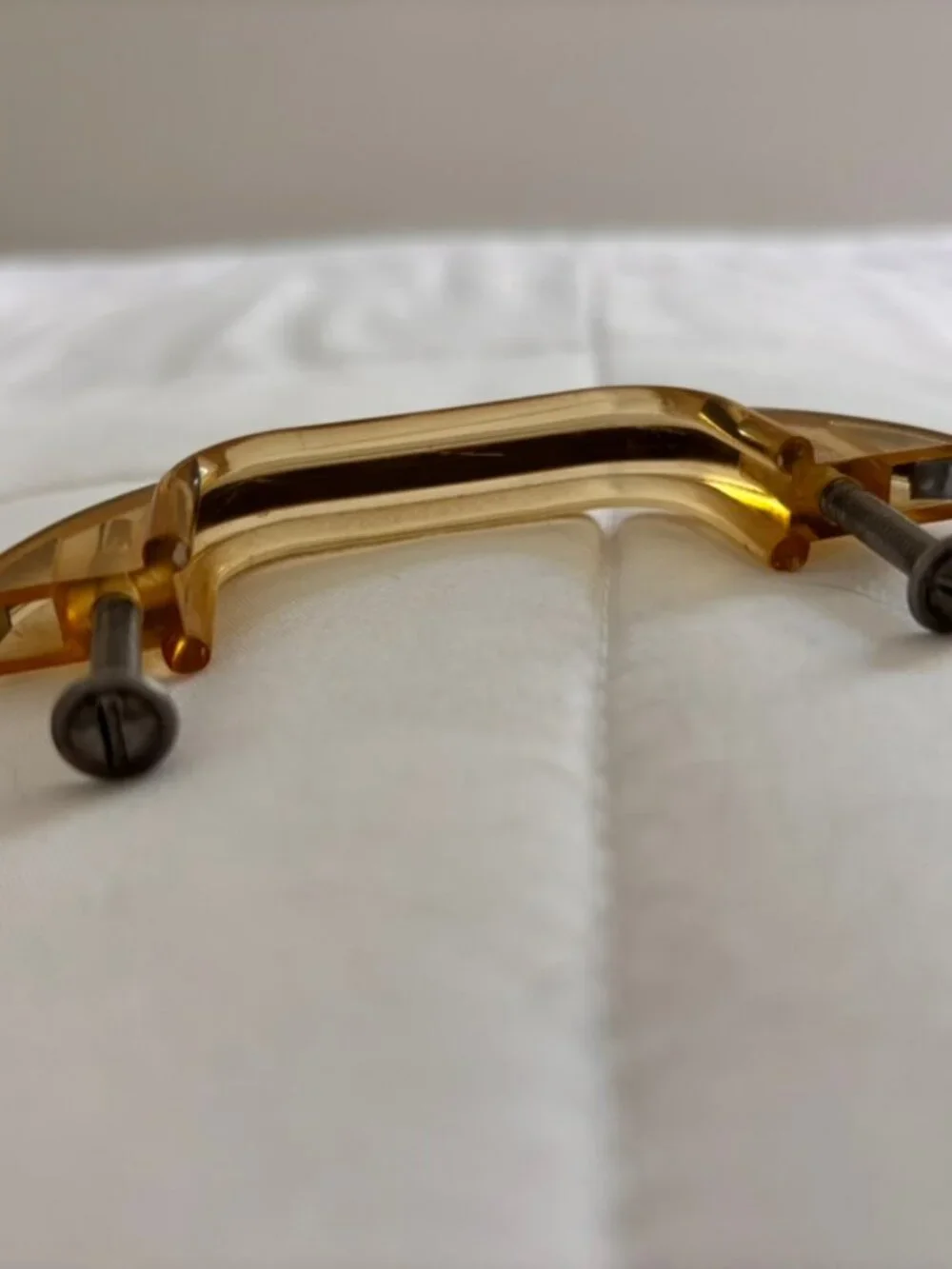 Vintage MCM Lucite or celluloid amber cabinet drawer pull handle